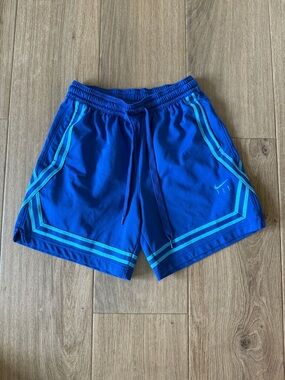 Nike women’s Dri-Fit Fly Crossover  Royal Blue Athletic Shorts size medium